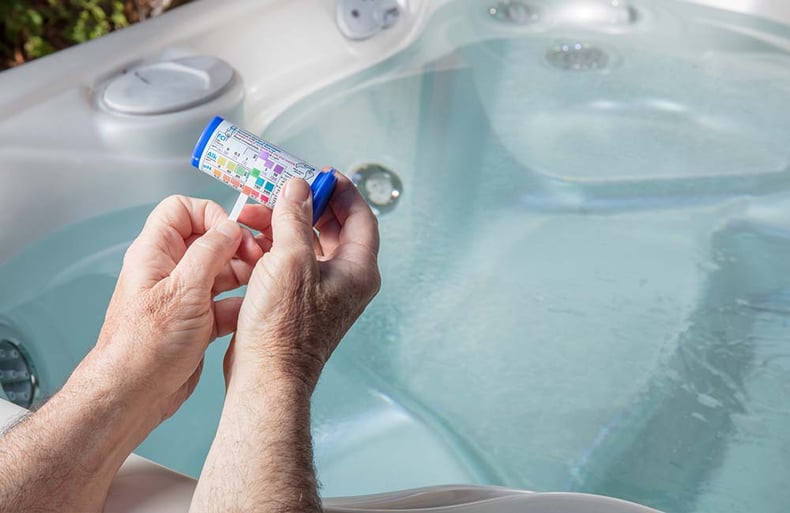 Checking Hot Tub Chloring With Test Strip