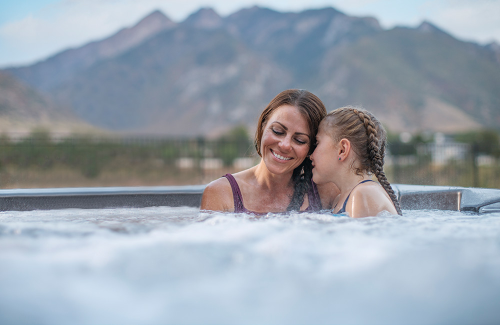Mother and Daughter in hot tub with Balanced Water