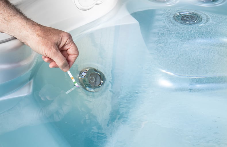 Testing Hot Tub Water With Test Strip