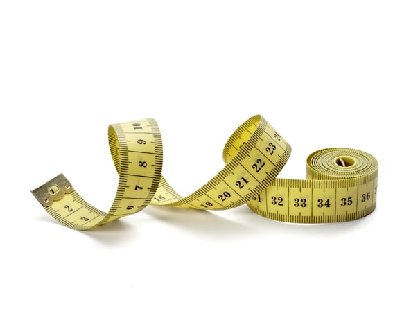 close up of measure tape on white background with clipping path