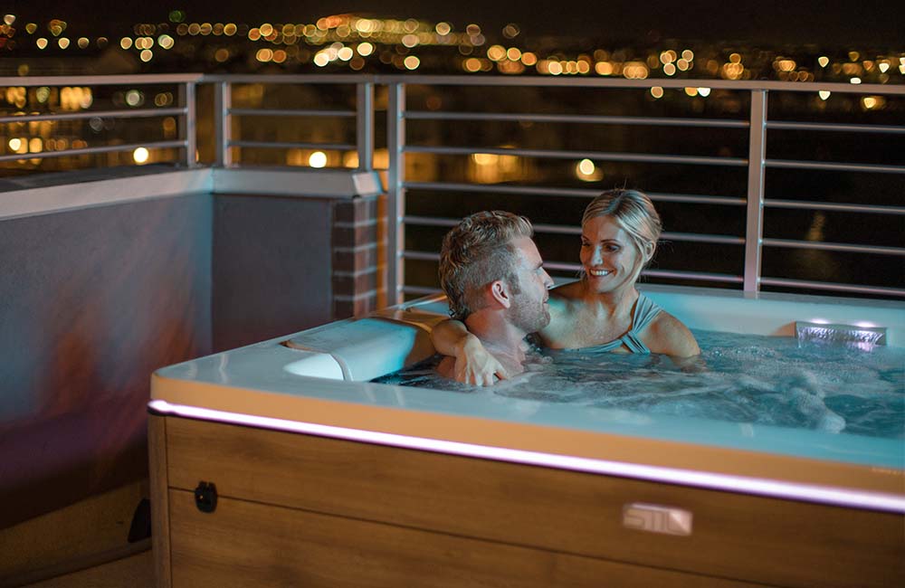 Couple relaxing in luxury hot tub